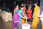 LIGHTLING A LAMP AS CHIEF GUEST AT SNDT UNIVERSITY